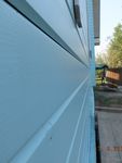 Покраска снаружи нового дома в Манихино